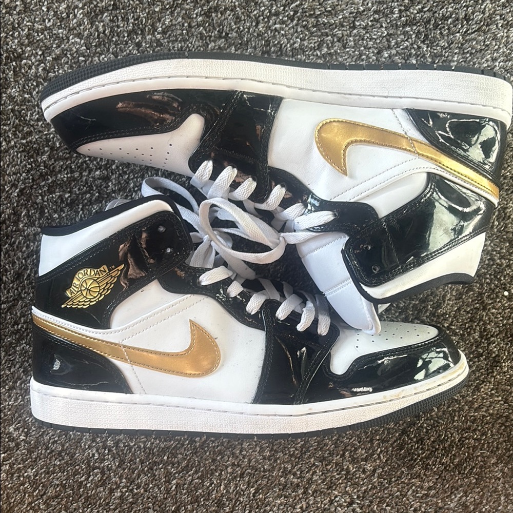 Jordan 1’s Black and Gold Sneakers
